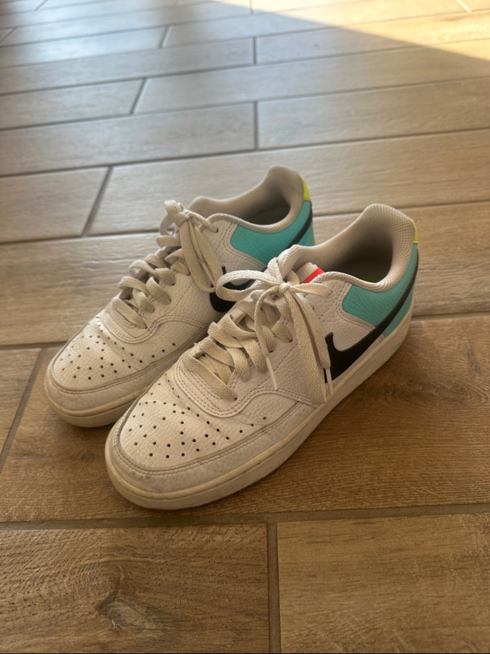 Nike Kids White Sneakers with Teal and Black Accents